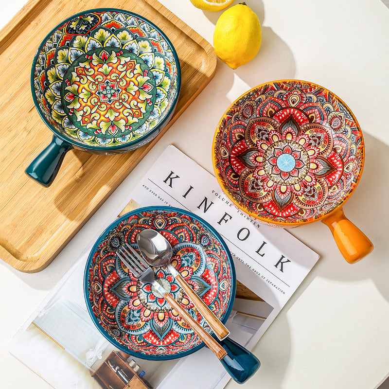 Colorful ceramic dishes with intricate patterns on a magazine with 'KINFOLK' branding.